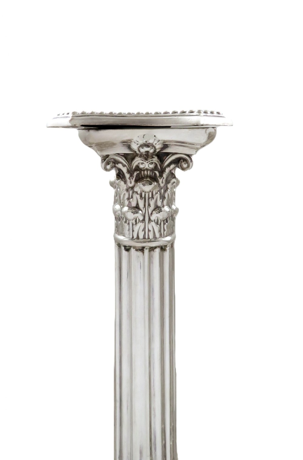 A pair of hallmarked sterling silver candlesticks featuring fluted Corinthian columns and square stepped bases with beaded trim. View IV