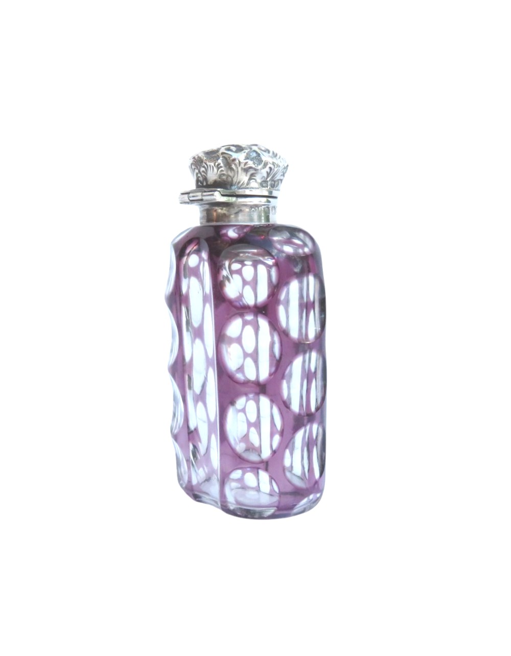An Edwardian purple overlay cut glass scent bottle with oval clear cutouts and an embossed sterling silver cap. View VII