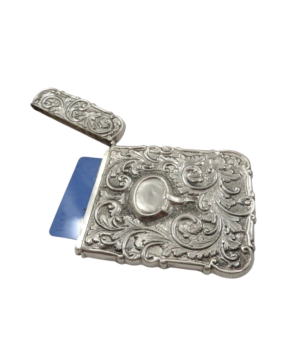 A Victorian sterling silver card case featuring a raised relief depiction of Windsor Castle framed by intricate scrollwork. View II