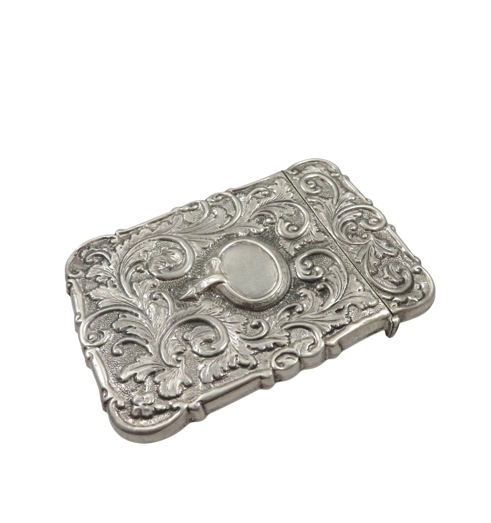 A Victorian sterling silver card case featuring a raised relief depiction of Windsor Castle framed by intricate scrollwork. View X