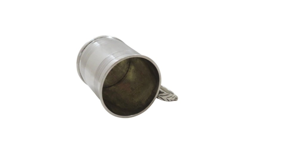 A straight-sided Georgian sterling silver mug featuring reeded horizontal bands and a scroll handle. View IV