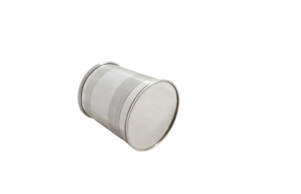 A straight-sided Georgian sterling silver mug featuring reeded horizontal bands and a scroll handle. View V