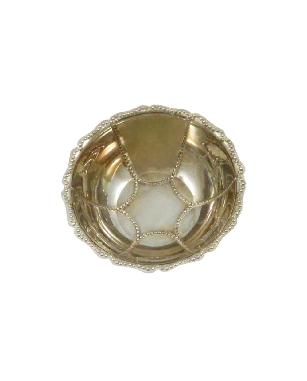 An Edwardian sterling silver fluted bowl featuring beaded rim detailing, resting inside a dark satin-lined presentation case. View IV
