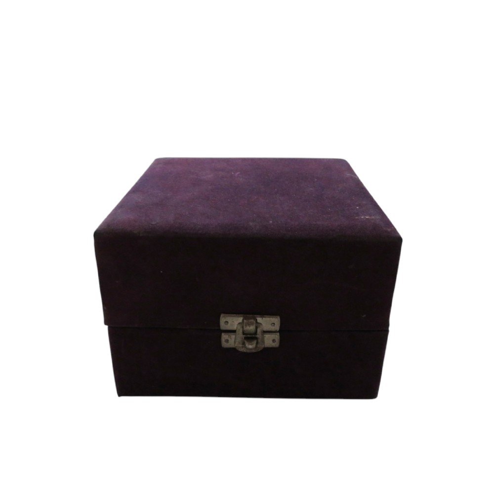 An Edwardian sterling silver fluted bowl featuring beaded rim detailing, resting inside a dark satin-lined presentation case. View IX