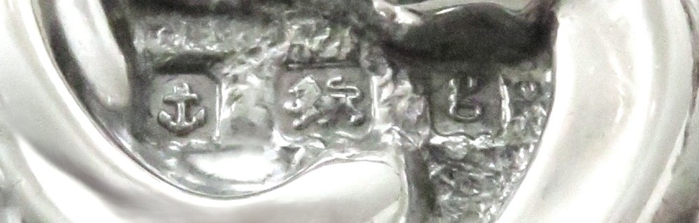 A rectangular Edwardian sterling silver dressing tray featuring ornate repousse scrollwork, lattice patterns, and a central unengraved cartouche. View II