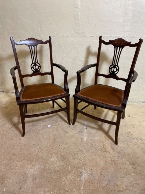 A Pair of Edwardian Mahogany Inlaid Nursing Chairs