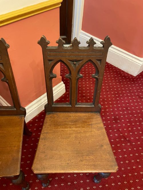 A PAIR OF VICTORIAN GOTHIC STYLE HALL CHAIRS - ADDITIONAL PHOTO 1