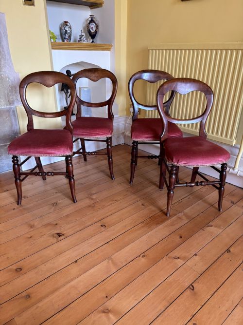 A Set of Four Victorian Balloon Back Beech Bedroom Chairs