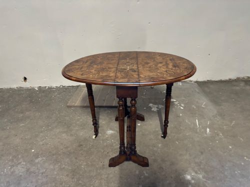 A Victorian Burr Walnut and Inlaid Sutherland Table