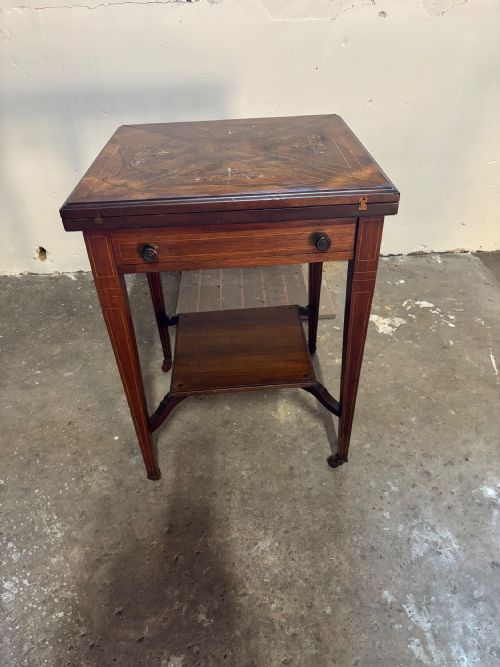 An Edwardian Rosewood and Inlaid Envelope Card Table