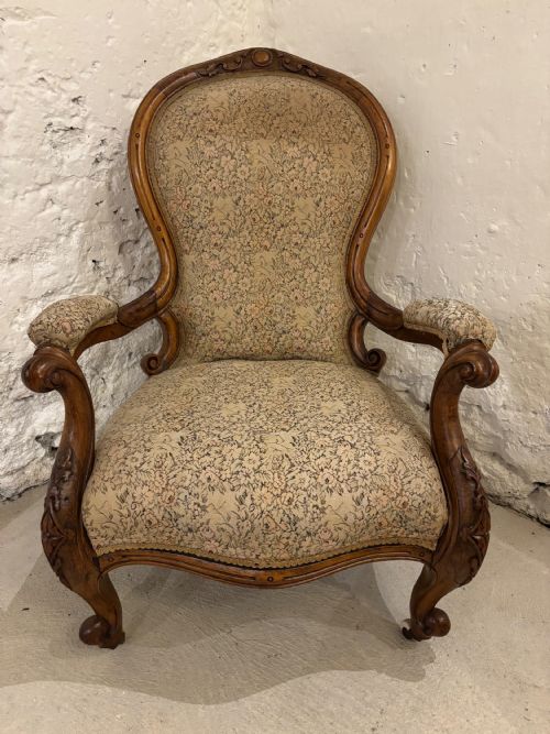 Victorian Walnut open armed Gentleman’s Armchair