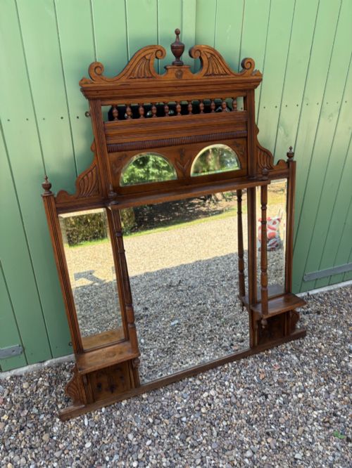 An Edwardian Walnut Over Mantle Mirror
