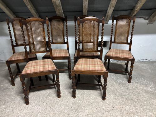 A Set of Six 17thc Style Oak Caned Back Dining Chairs.