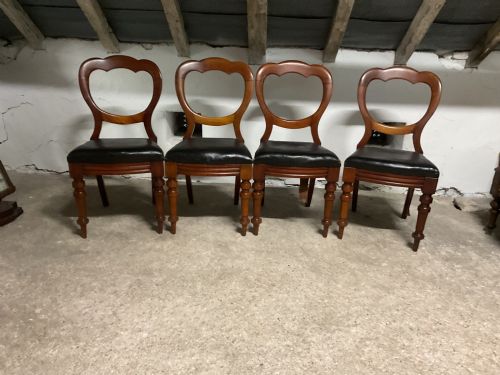 A Set of Four Victorian Balloon Back Dining Chairs