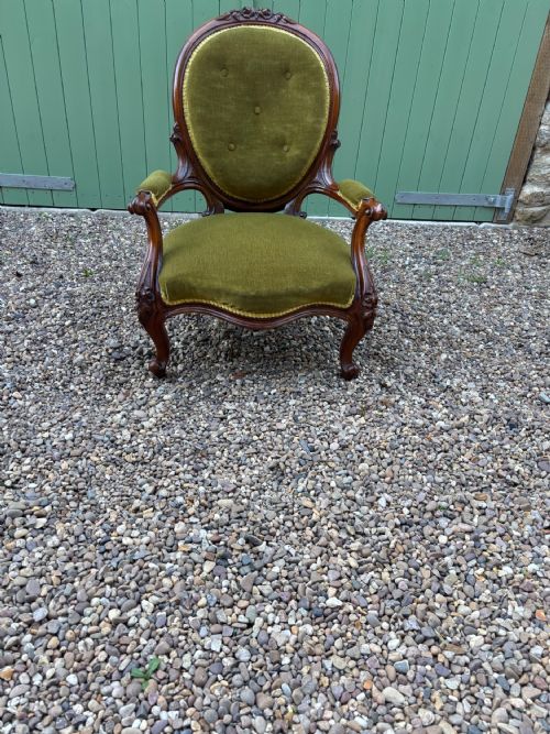 A Victorian Open Armed  Mahogany Armchair