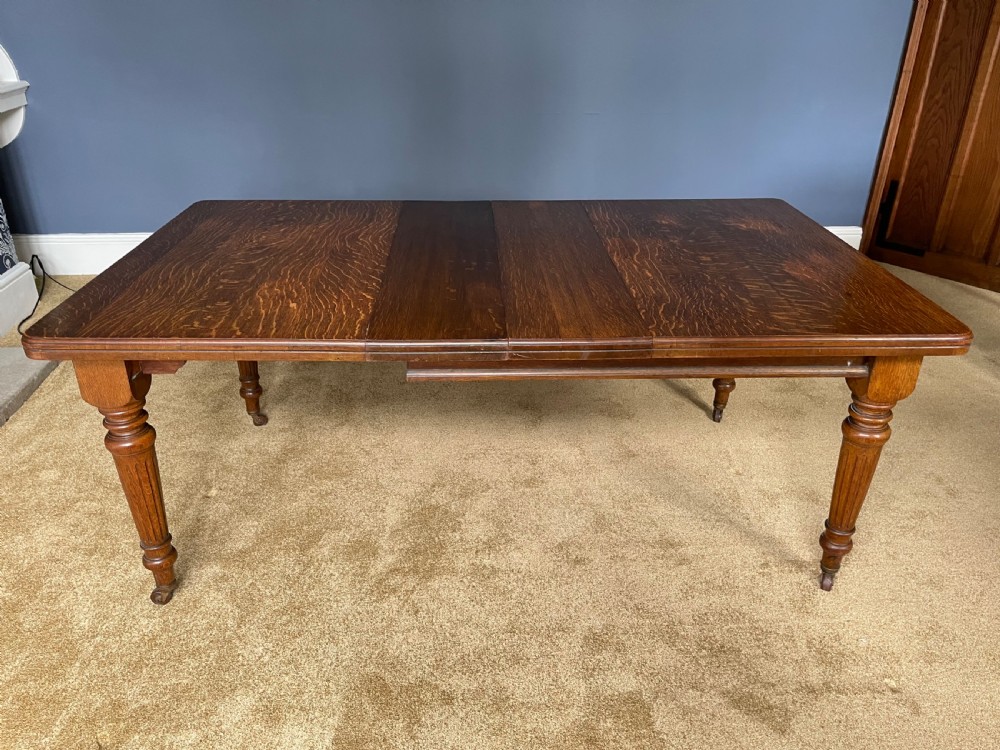 Victorian oak wind out dining table