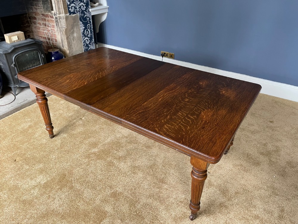 Victorian oak wind out dining table View II