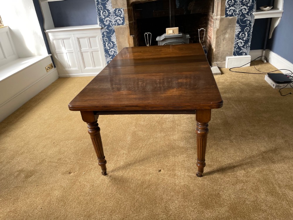 Victorian oak wind out dining table View IV