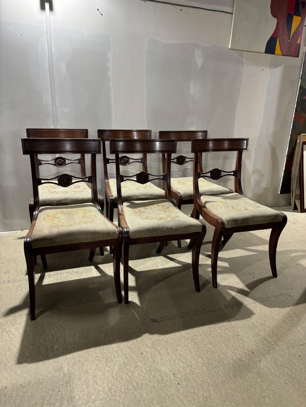 A set of six Regency mahogany dining chairs