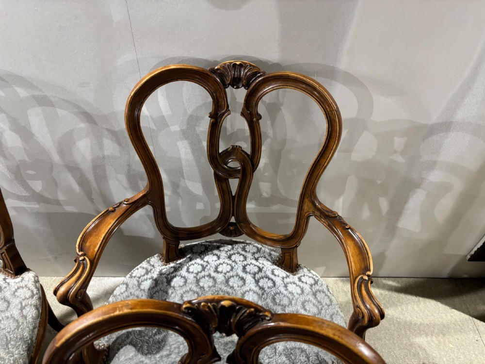 A set of eight French walnut dining chairs c1920 View IX