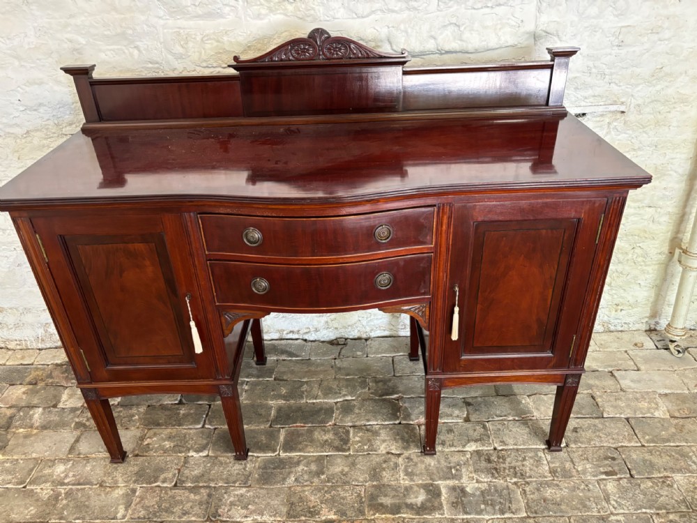 An Edwardian mahogany Sideboard View III