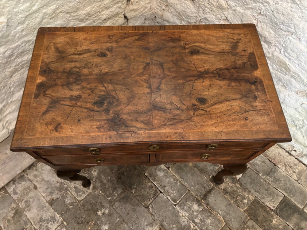 Georgian walnut and cross banded Lowboy View IV