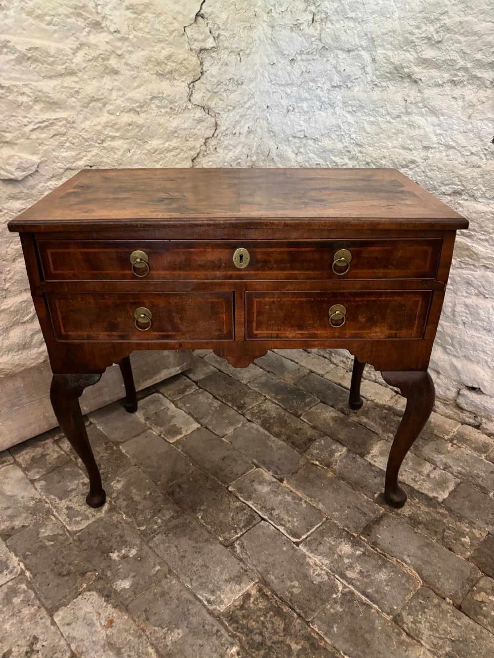 Georgian walnut and cross banded Lowboy