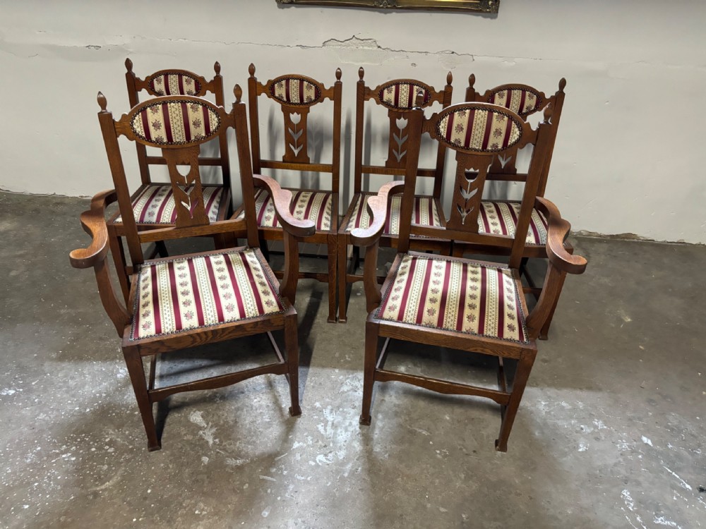 Set of six Edwardian Art Nouveau oak dining chairs