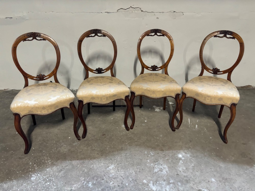 Set of four Victorian Walnut balloon back dining chairs
