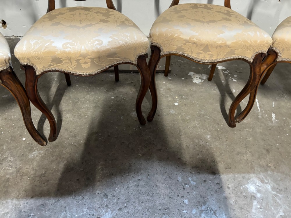 Set of four Victorian Walnut balloon back dining chairs View II