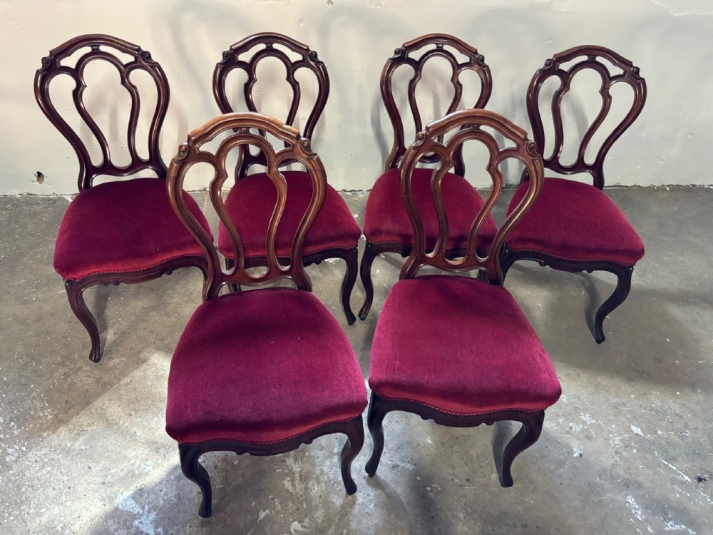 A set of six Victorian mahogany balloon back dining chairs