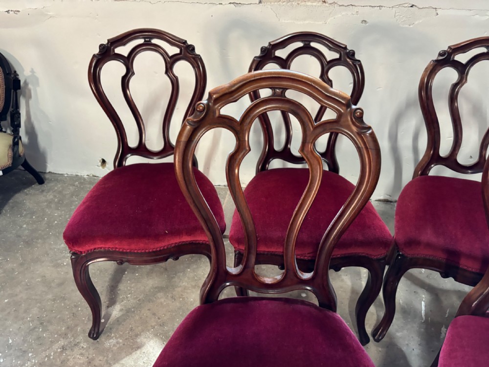 A set of six Victorian mahogany balloon back dining chairs View II