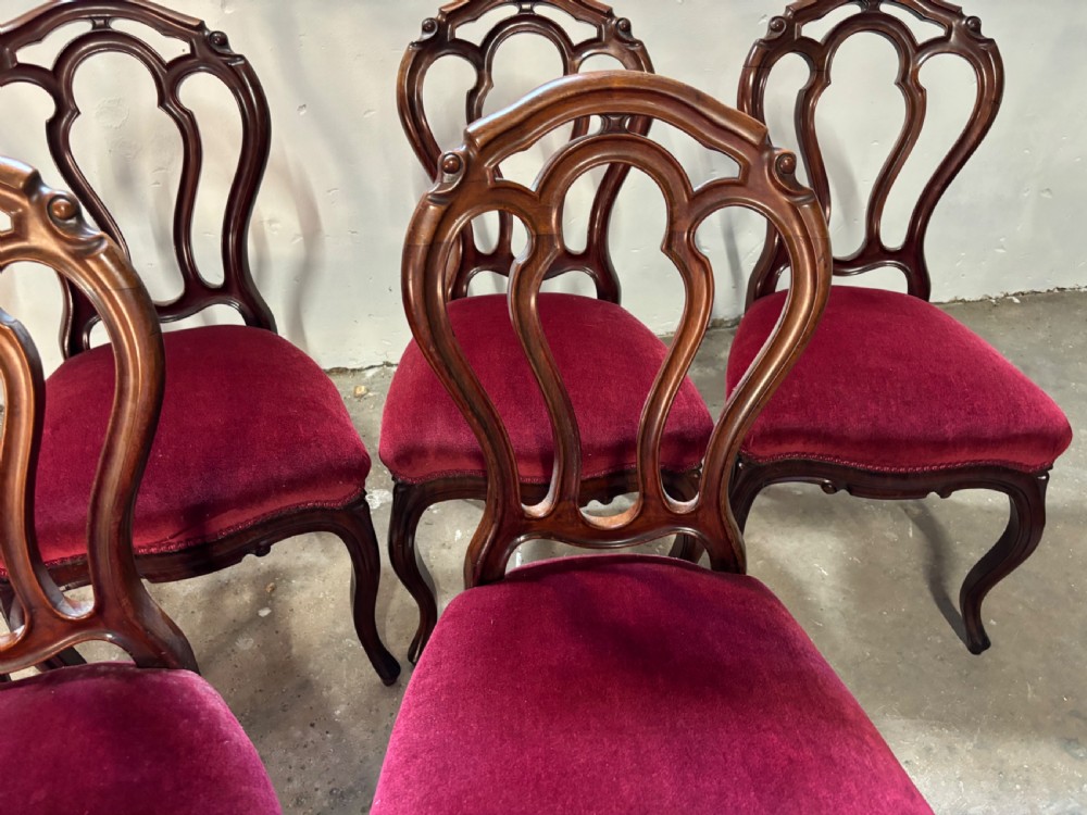 A set of six Victorian mahogany balloon back dining chairs View III