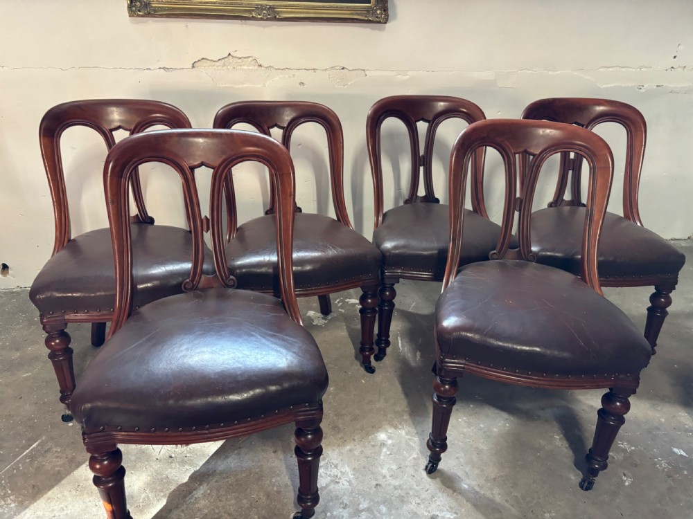 A set of six Victorian mahogany dining chairs
