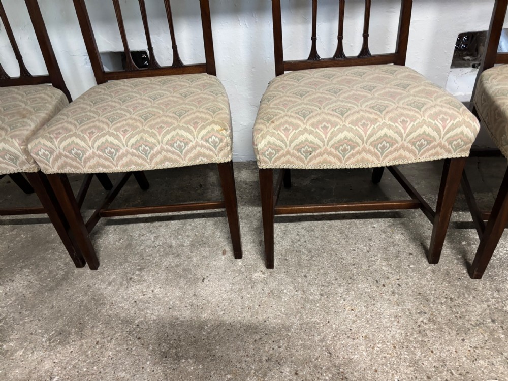 A set of four George III mahogany dining chairs. View IV