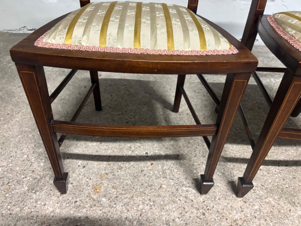 A pair of Edwardian Mahogany and Inlaid high back Bedroom Chairs View V