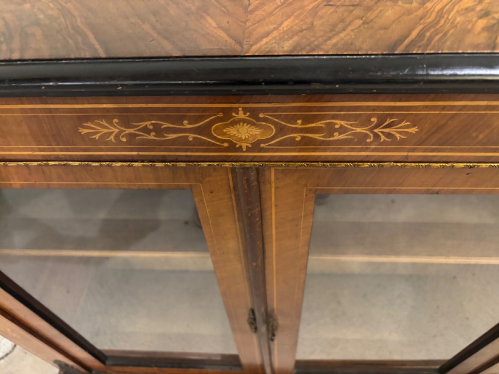 A Victorian double door Walnut and Marquetry inlaid Pier Cabinet View III
