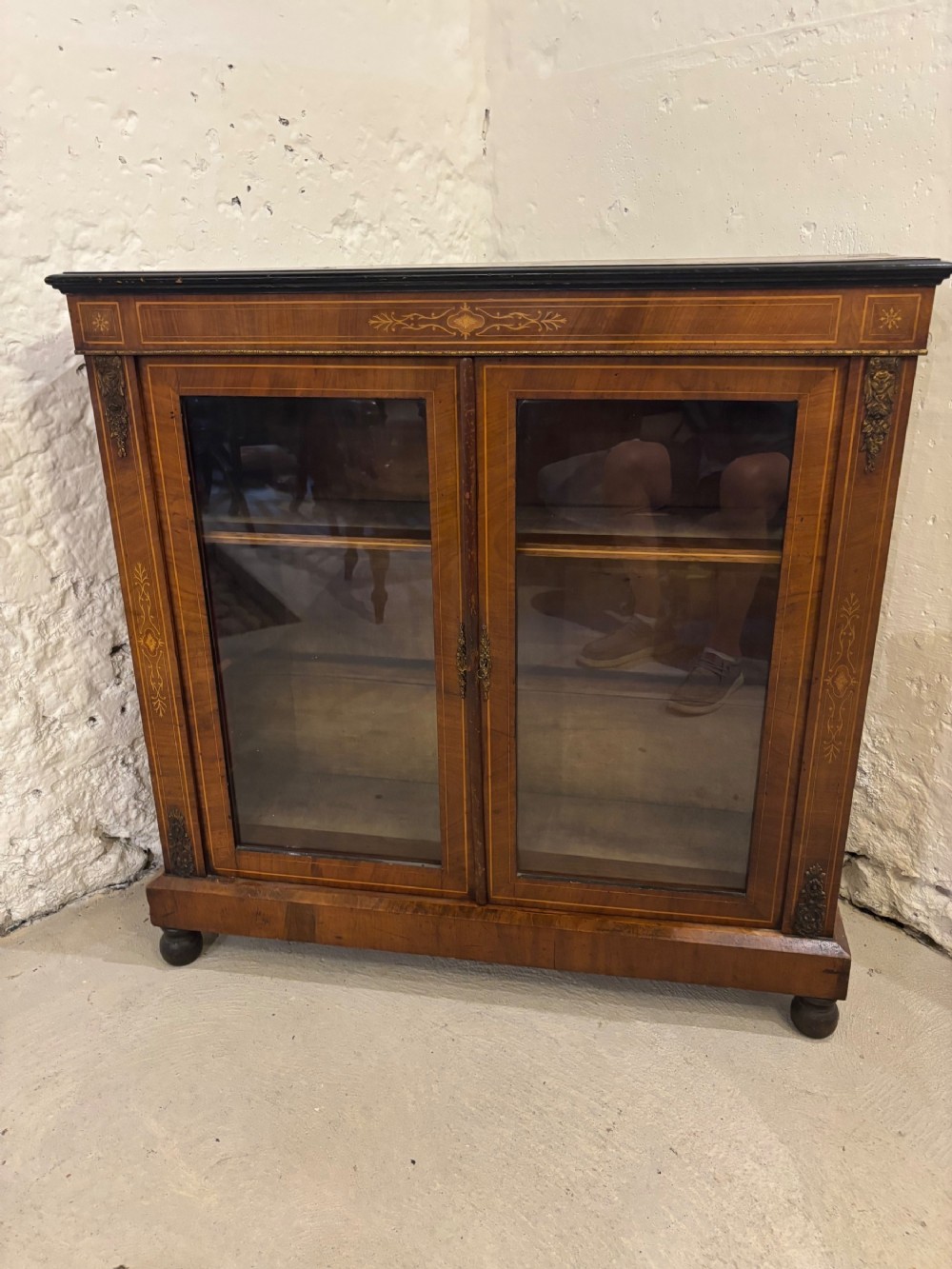 A Victorian double door Walnut and Marquetry inlaid Pier Cabinet