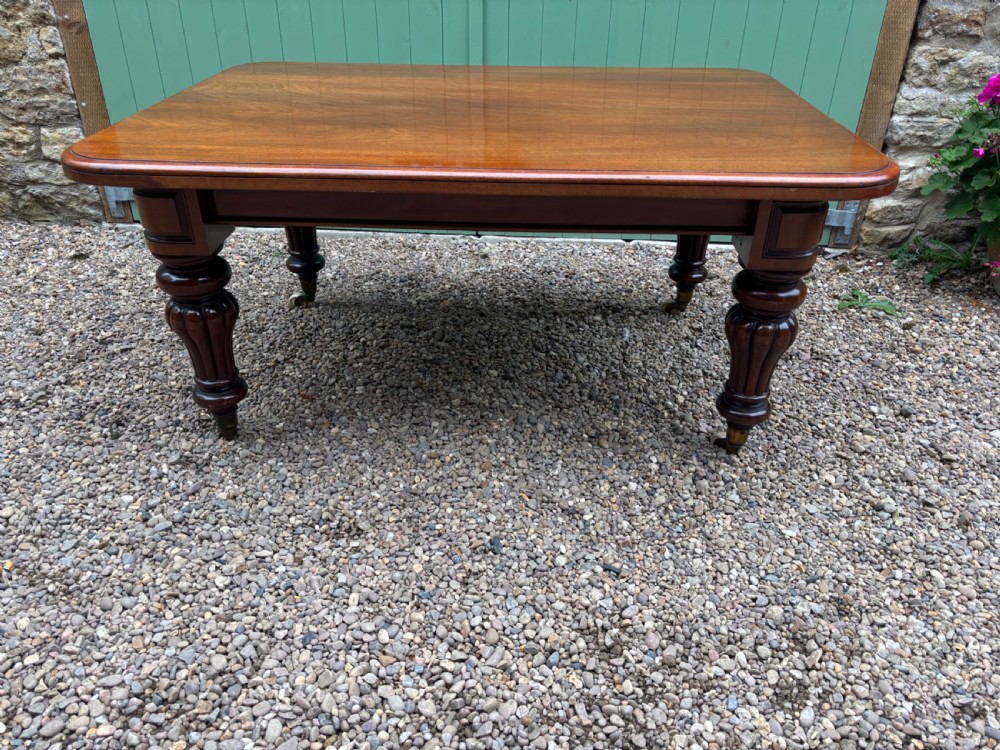 A Victorian Mahogany Dining Table