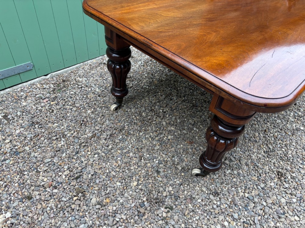 A Victorian Mahogany Dining Table View III