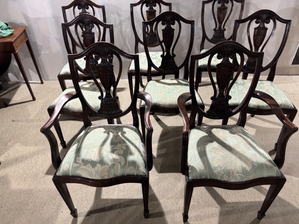 A Set of Eight Mahogany Shield Back Hepplewhite Style Dining Chairs