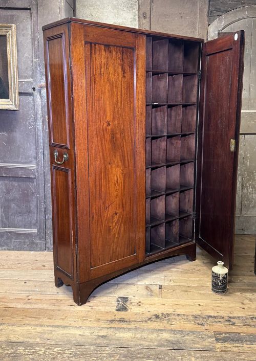 A SLENDER REGENCY MAHOGANY ESTATE CABINET BY REPUTE FROM A CAMBRIDGE UNIVERSITY COLLEGE View III
