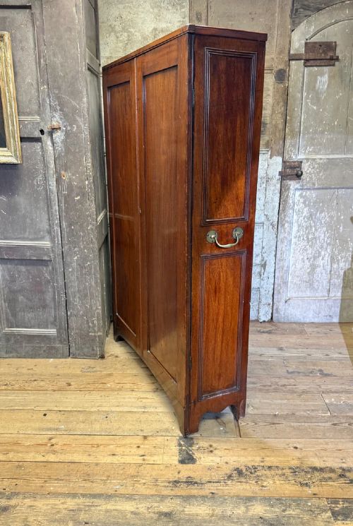 A SLENDER REGENCY MAHOGANY ESTATE CABINET BY REPUTE FROM A CAMBRIDGE UNIVERSITY COLLEGE View V