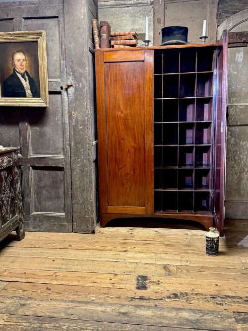 A SLENDER REGENCY MAHOGANY ESTATE CABINET BY REPUTE FROM A CAMBRIDGE UNIVERSITY COLLEGE View VI
