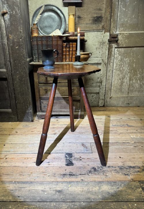 AN 18TH CENTURY PRIMITIVE OAK SLAB TOP OCTAGONAL CRICKET TABLE OF EXCEPTIONAL COLOUR View III