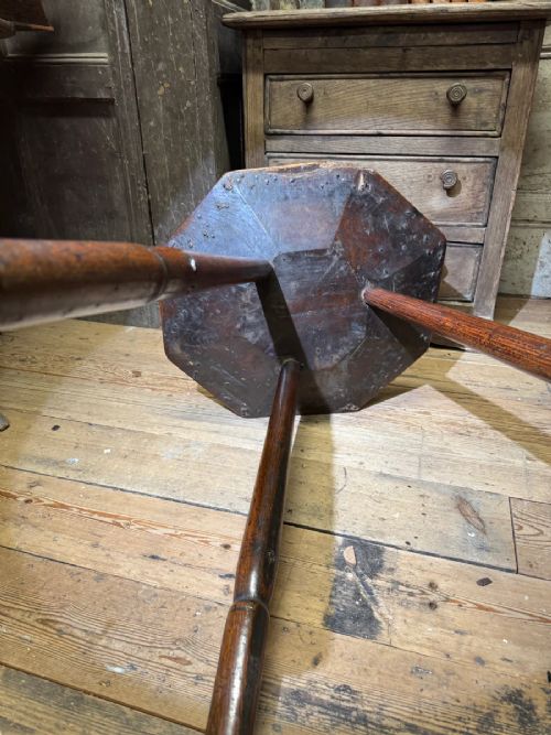 AN 18TH CENTURY PRIMITIVE OAK SLAB TOP OCTAGONAL CRICKET TABLE OF EXCEPTIONAL COLOUR View V
