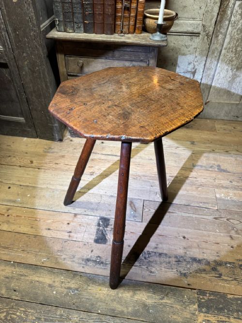 AN 18TH CENTURY PRIMITIVE OAK SLAB TOP OCTAGONAL CRICKET TABLE OF EXCEPTIONAL COLOUR View VIII