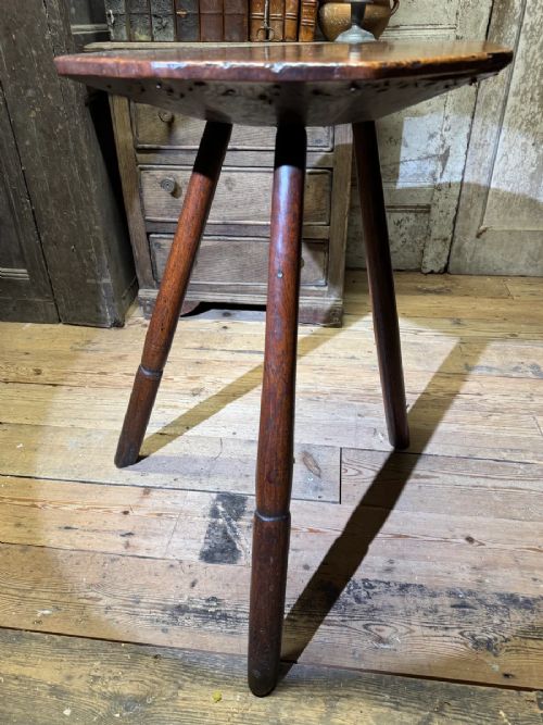 AN 18TH CENTURY PRIMITIVE OAK SLAB TOP OCTAGONAL CRICKET TABLE OF EXCEPTIONAL COLOUR View IX