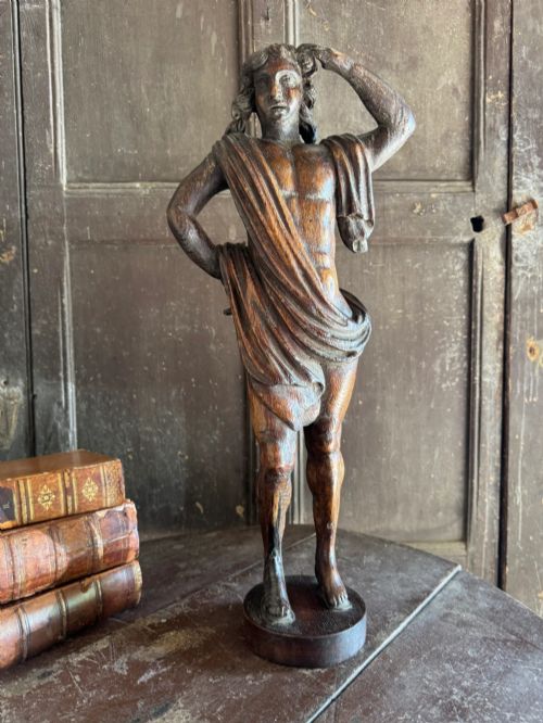 An 18th Century Oak Carved Classical Figure