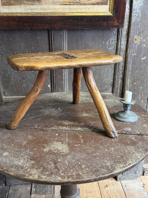 18TH CENTURY VERNACULAR OAK STOOL WITH HEDGEROW SPLAYED LEGS AND BLACKSMITH REPAIRS C 1790 - ADDITIONAL PHOTO 1